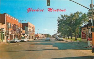 Postcard Montana Glendive Street Scene autos Ellis Billings 23-9828