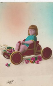 RP: Girl in a peddle car, 1900-10s