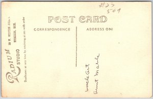 Couple Woman Sitting on Chair Man Standing Beside Her Real Photo RPPC Postcard 