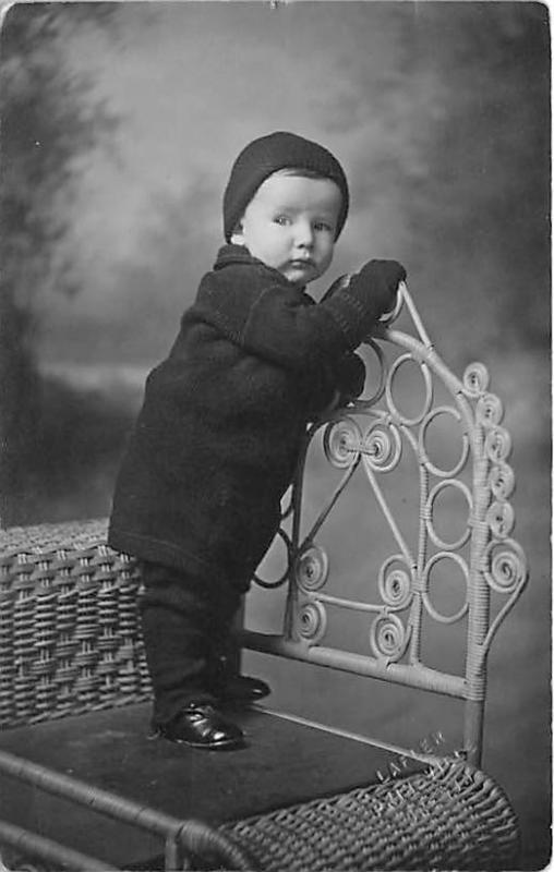 Young child standing on chair Child, People Photo 1916 