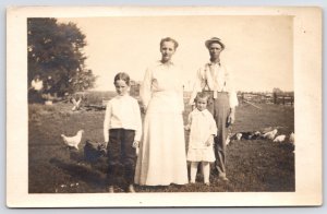 RPPC Poultry Farmer w/Suspenders, Strange Tie~Family of 4 Plus Chickens~c1910 PC