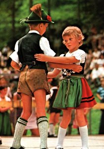 VINTAGE CONTINENTAL SIZE POSTCARD PENSIVE YOUNG GERMAN BOY AND GIRL DANCING