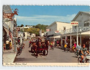 Postcard Busy Main Street if Mackinac Island Michigan USA