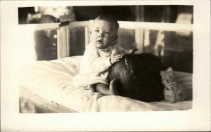 Unusual - Baby in Crib w/ Pumpkin & Stuffed Dog c1910 RPPC Christmas Poem