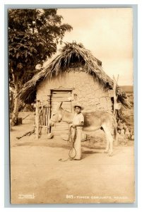 Vintage 1930's RPPC Postcard Boy with a Donkey Adobe Hut Small Town Mexico