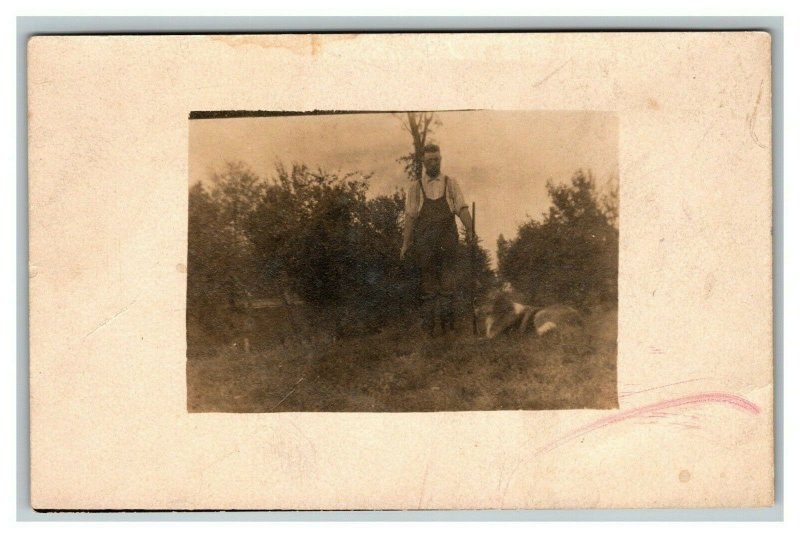 Vintage 1900's RPPC Postcard Man with Hunting Rifle and Dog in Fields