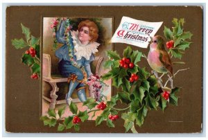 c1910's Christmas Boy Making Garland Holly Berries Bird Embossed Postcard 