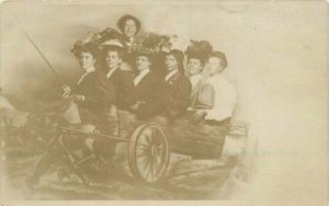 C-1905 Photo Studio Prop People Burro Wagon interior Postcard 21-2185