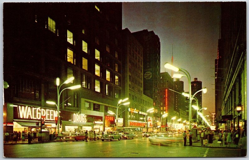 State Street At Night Chicago Illinois IL Shopes Stores & Attractions Postcard