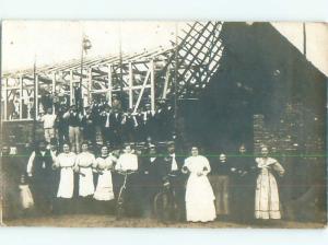 rppc c1910 ANTIQUE BICYCLES IN CROWD AT CONSTRUCTION SITE AC8780
