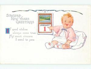 Unused Pre-Linen new year BABY POINTS TO CALENDAR k4982@