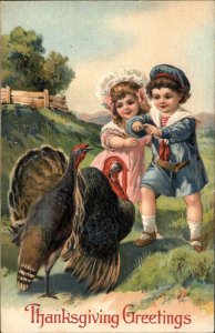 PFB Serie 8857 Children Feed Thanksgiving Turkeys c1910 Vintage Postcard