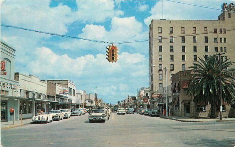 Texas Harlingen Jackson Street 1950s autos Whaley Dexter Postcard 22-5709