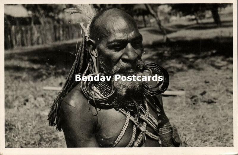 dutch new guinea, Papua with Hair Extensions Earrings of Casuar Pens 1950s RPPC