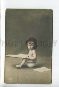 431962 Little boy in a hat with a newspaper and a pot Vintage photo postcard