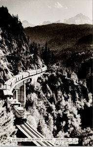 Squamish BC Train entering Cheakamus Canyon PGE Railway Unused RPPC Postcard G35