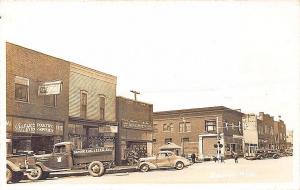 Bangor MI Street View Business District Old Truck & Cars RPPC Postcard