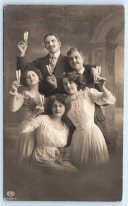 RPPC German NEW YEAR'S GREETING ~ GROUP With CHAMPAGNE GLASSSES c1910s  Postcard