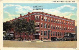 Columbus Nebraska~Hotel Thurston~Cars Parked along Street~Chairs on Sidewalk~'43