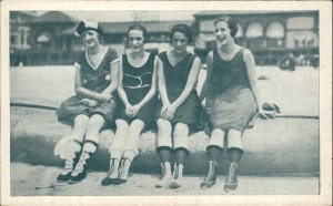 4 Bathing Beauty Woman Sit on Overturned Boat c1910 Postcard