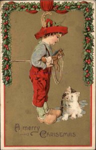 Christmas Little Boy with Toy Horse Talks to Kitten Kitty Cat c1910 Postcard