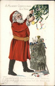 Santa Claus Christmas Tree Elephant Pull Toy Jester Doll c1910 Vintage Postcard