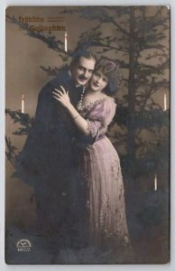RPPC Christmas Dapper Man And Pretty Edwardian Woman At Tree Postcard D31