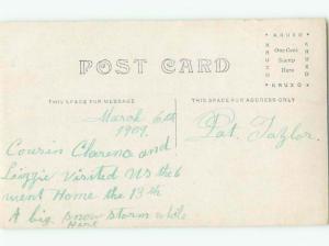 rppc Pre-1920's DOG SITTING ON CHAIR AC8373