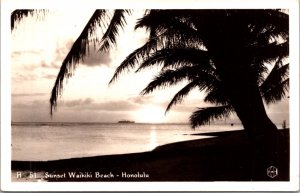 Real Photo Postcard Sunset at Waikiki Beach, Honolulu, Hawaii