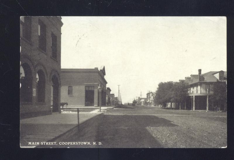 RPPC COOPERSTOWN NORTH DAKOTA DOWNTOWN MAIN STREET REAL PHOTO POSTCARD