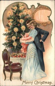 Family Christmas 4 of 4 Proud Parents Cradle Baby Under Tree c1910 PC