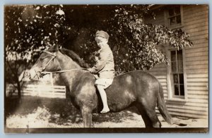 c1910's Little Boy Ride On Horse House Backyard RPPC Photo Antique Postcard