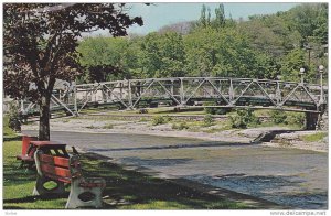 Foot Bridge over the picturesque Ganarska River, Port Hope, Ontario, Canada, ...