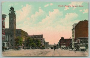 Canton Ohio~Trio of Trolleys~Cloak & Suit Shop~Banner~Bicycler~Clocktower~c1910