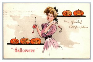 Vintage 1908 German Made Halloween Postcard Beautiful Woman Carving Pumpkins