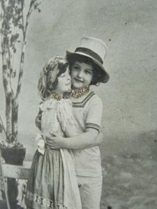 Greeting GARDENING THEME Children with Rake & Watering Can c1914 Postcard