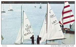 Sail enthusiats take to the placid waters of Calgary´s Glenmore Dam, Calgary...