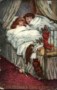 Christmas Children and Kittens in Bed Art Nouveau c1910 Vintage Postcard