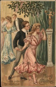 Christmas Boy Pulls Girl Under Mistletoe Romance c1910 Vintage Postcard