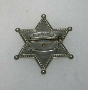 VINTAGE CHILDS JUNIOR POLICE METAL CAST SIX POINT BADGE