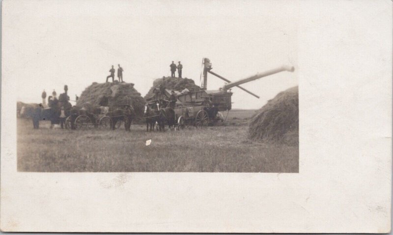 Cold Lake Alberta Farming Scene Farm Machinery Horses RPPC Postcard H33 *as is