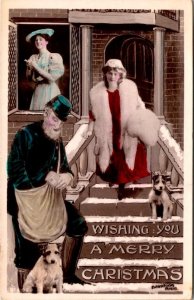 RPPC,  MERRY CHRISTMAS Mailman~Dogs~Woman~Fur Stole/Muff DAVIDSON BROS Postcard