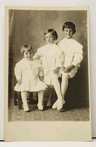 RPPC Three Victorian Children Lovey Identical Outfits 1913 Photo Postcard H13