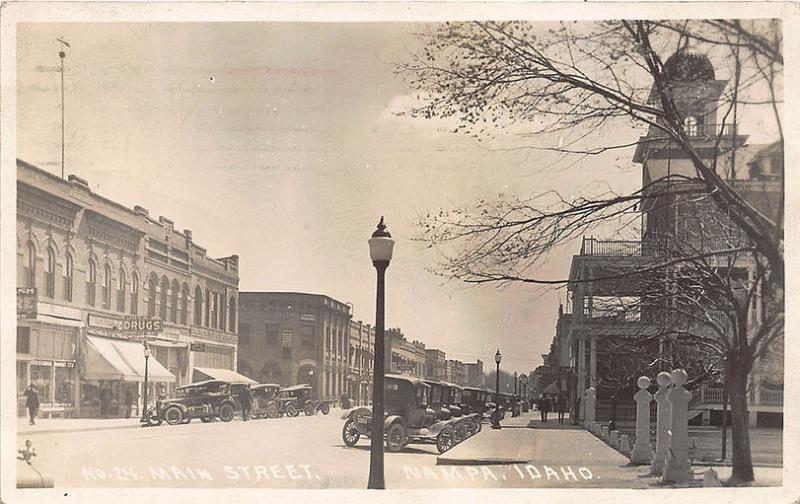 Nampa ID Main Street Store Fronts Old Cars in 1926 Real Photo RPPC Postcard