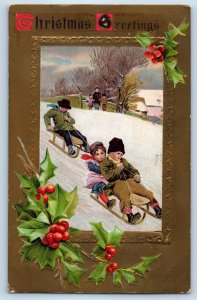 1909 Christmas Greetings Children Sledding On Winter Scene Union NY Postcard