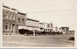 Stettler Alberta Street Scene Merchants Bank Sharpe & Page RPPC Postcard G98