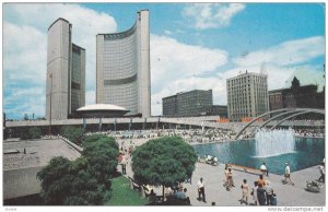 The City Hall showing Nathan Phillips Square & the reflecting pool & fountain...