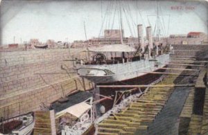 Egypt Steamer Docked At Suez dock In The Suez Canal