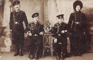 Four Russian Soldiers or Officers #8, Real Photo Postcard