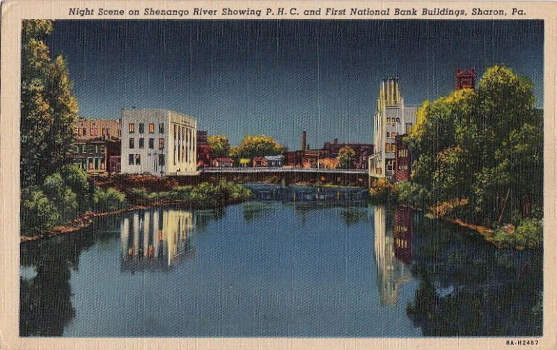 Postcard Night Scene Shenango River Showing PHC First National Bank Sharon PA